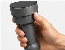 A hand holding a TOOKAS shaker
